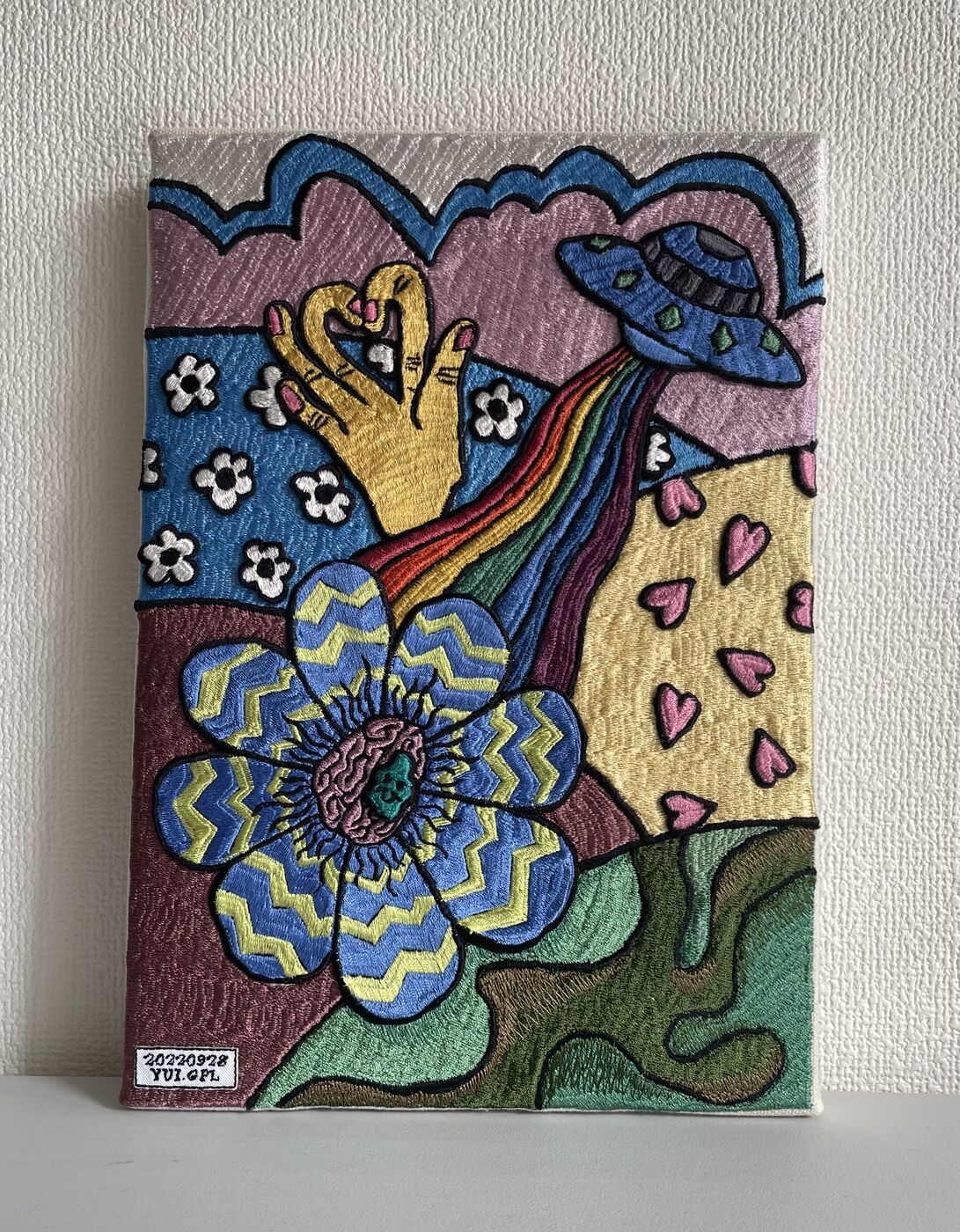 Embroidered canvas, serpent and camellia (sample)